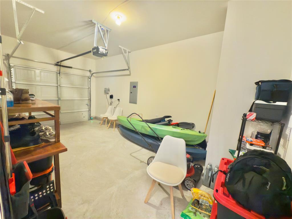 6000 Holly Spg Road Princeton, TX 75407 - Photo 27 of 27 a living room with furniture and a wooden floor