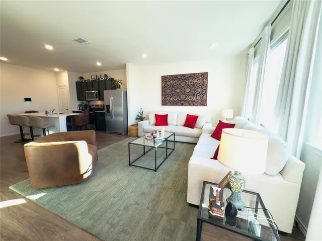 a living room with furniture and a couch