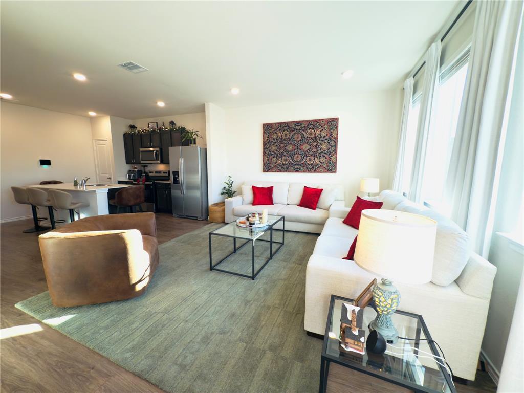 6000 Holly Spg Road Princeton, TX 75407 - Photo 8 of 27 a living room with furniture and a couch