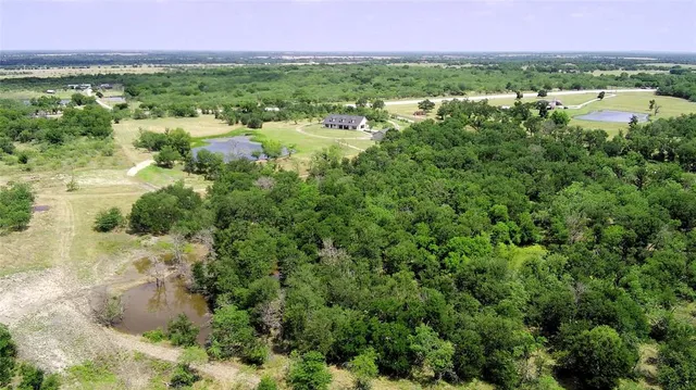 a view of city with ocean