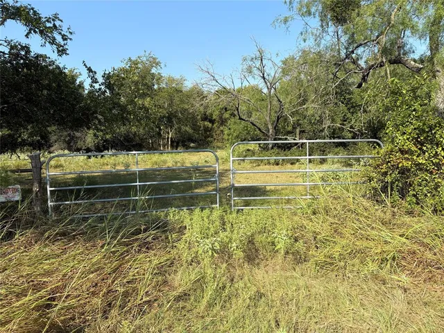 a view of a swimming pool with an outdoor space