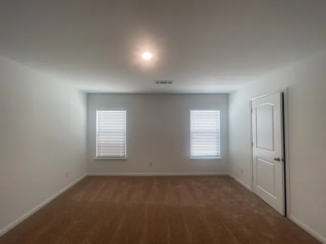 an empty room with window