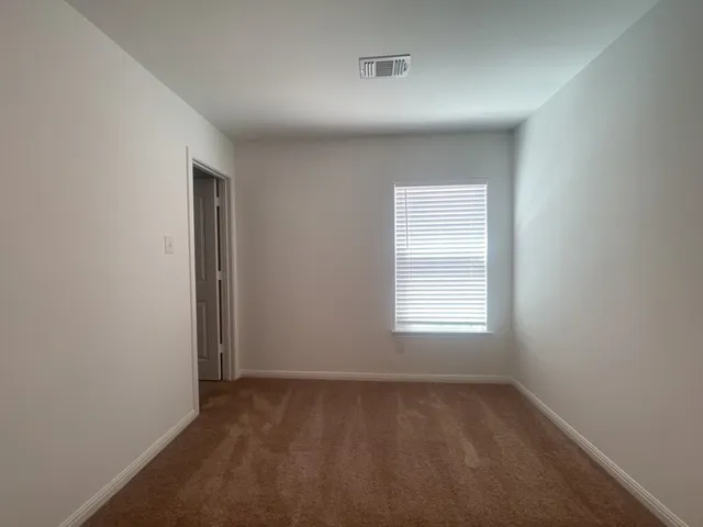 an empty room with a window