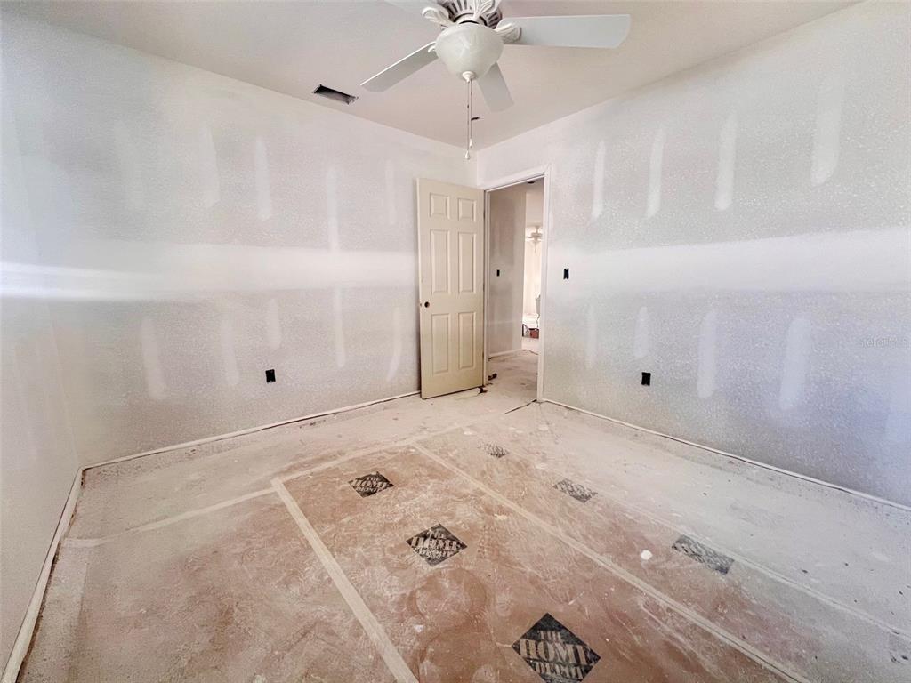 1977 Beach Road, Unit 21 Englewood, FL 34223 - Photo 12 of 27 a view of a room with an empty space