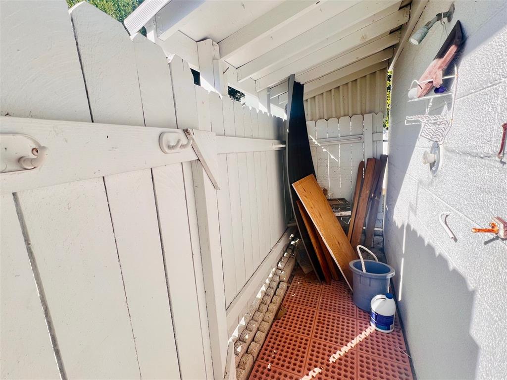 1977 Beach Road, Unit 21 Englewood, FL 34223 - Photo 14 of 27 a view of walk in closet with clothes and shoes