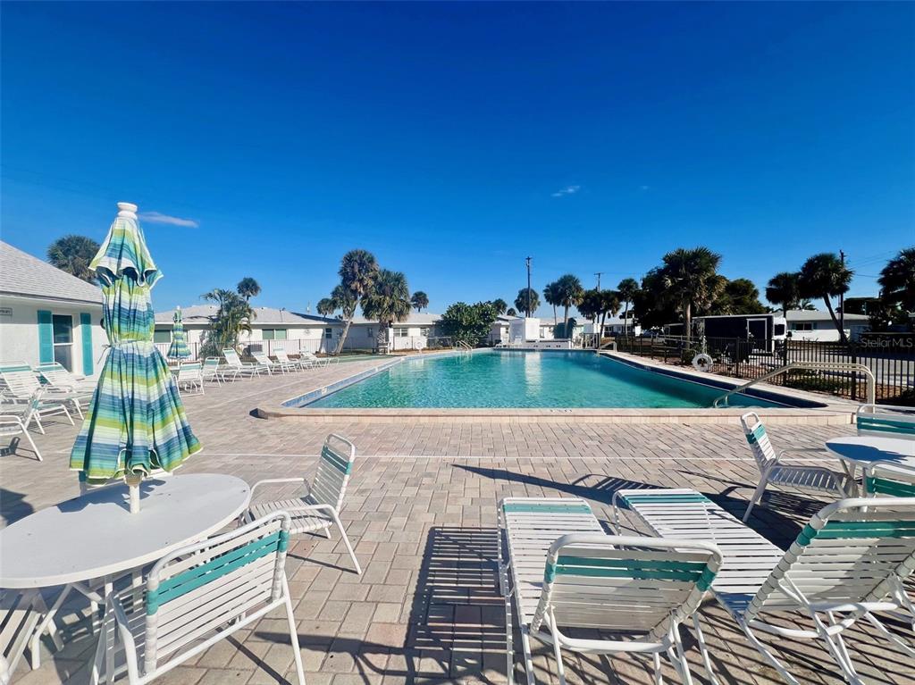 1977 Beach Road, Unit 21 Englewood, FL 34223 - Photo 20 of 27 a view of yard with patio