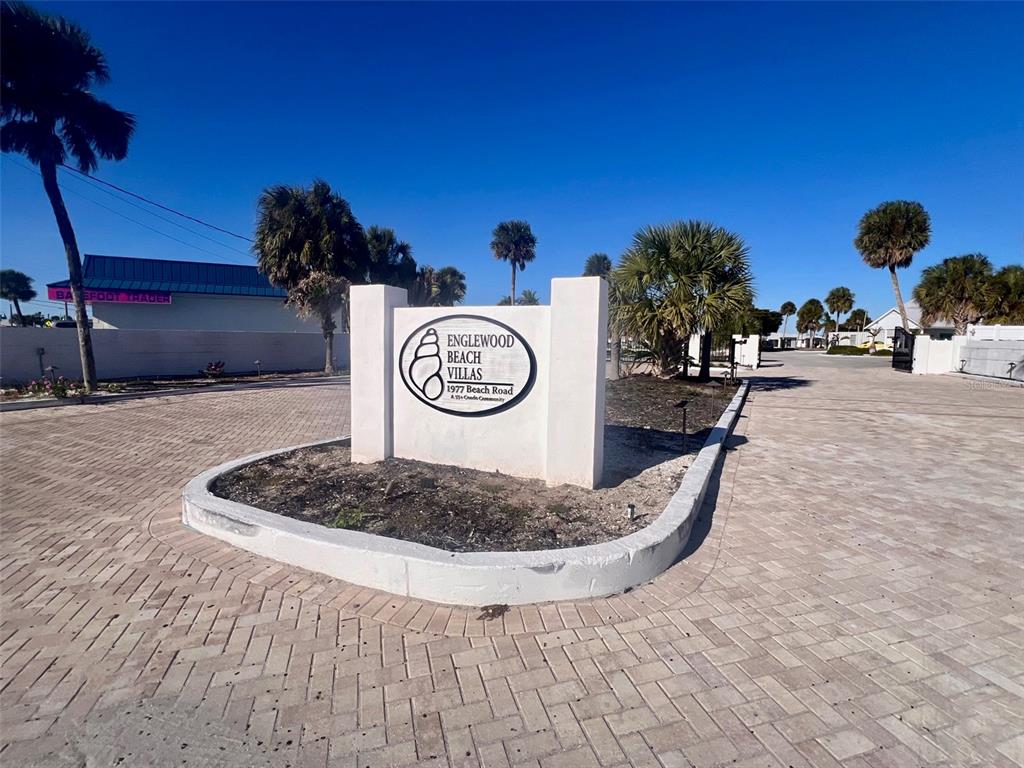 1977 Beach Road, Unit 21 Englewood, FL 34223 - Photo 2 of 27 a view of staircase with a rug