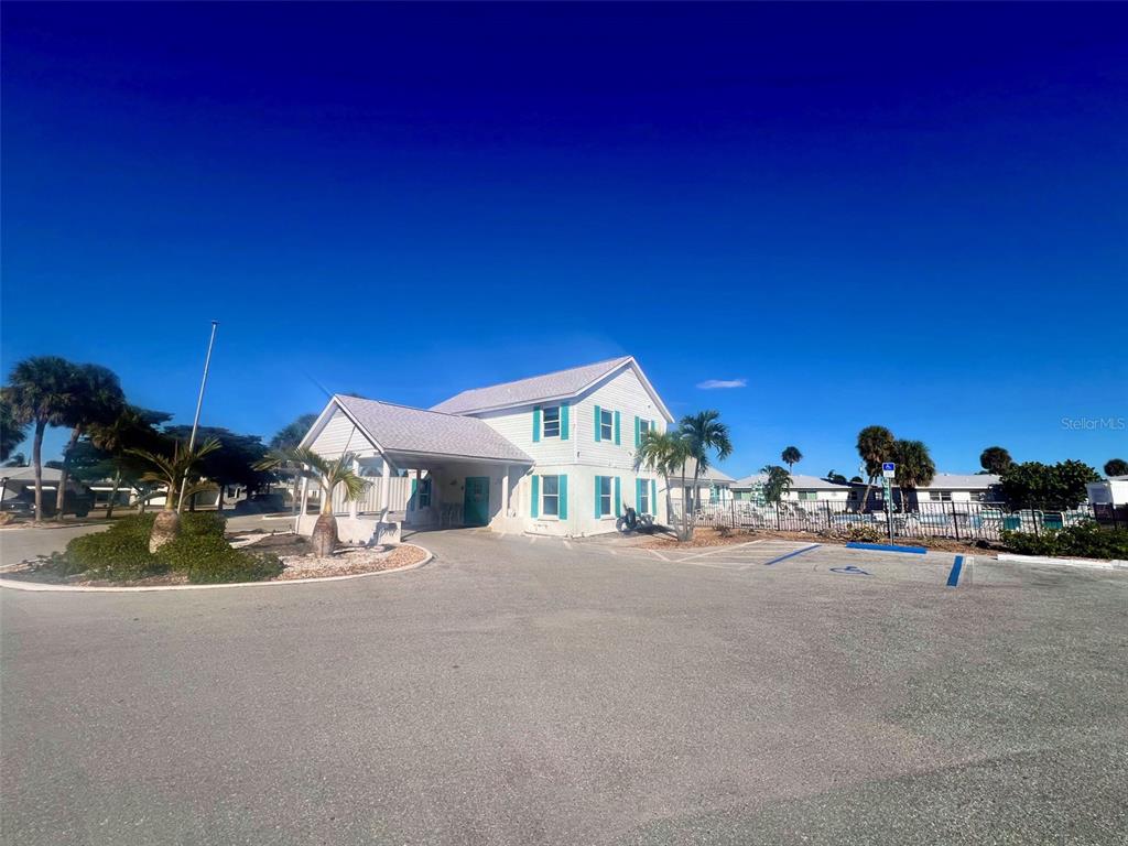 1977 Beach Road, Unit 21 Englewood, FL 34223 - Photo 21 of 27 a view of a house with outdoor space and sitting area