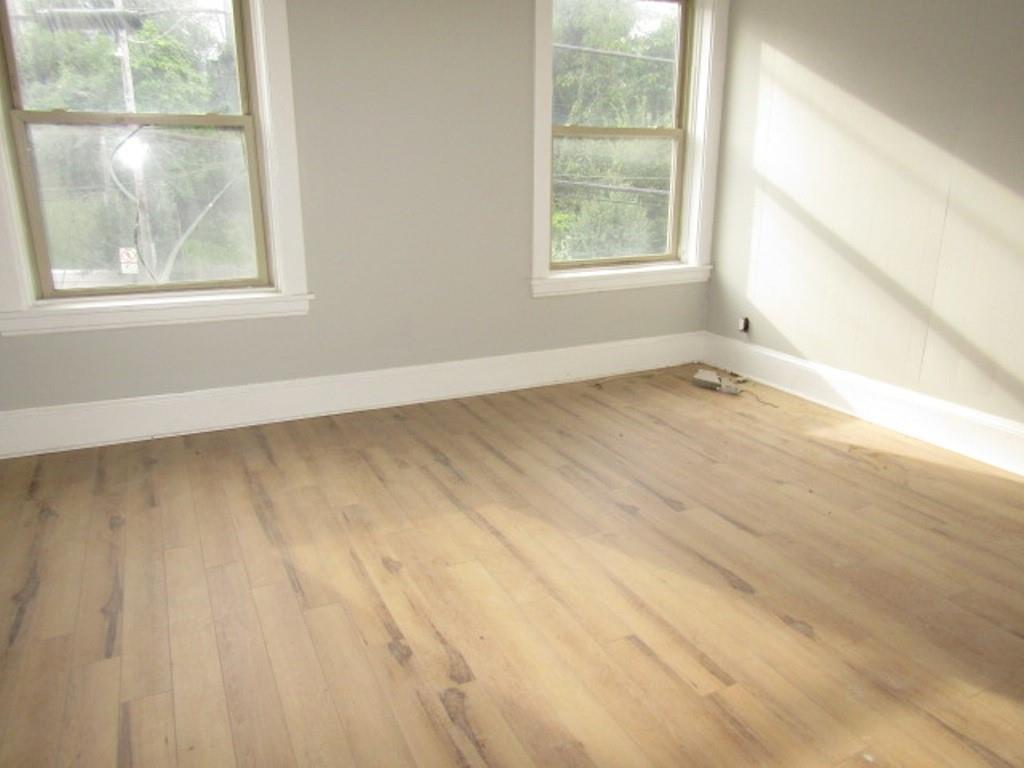 407-409 West 8th Avenue Homestead, PA 15120 - Photo 15 of 36 an empty room with a window