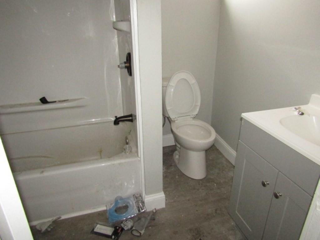 407-409 West 8th Avenue Homestead, PA 15120 - Photo 21 of 36 a bathroom with a sink a toilet and shower