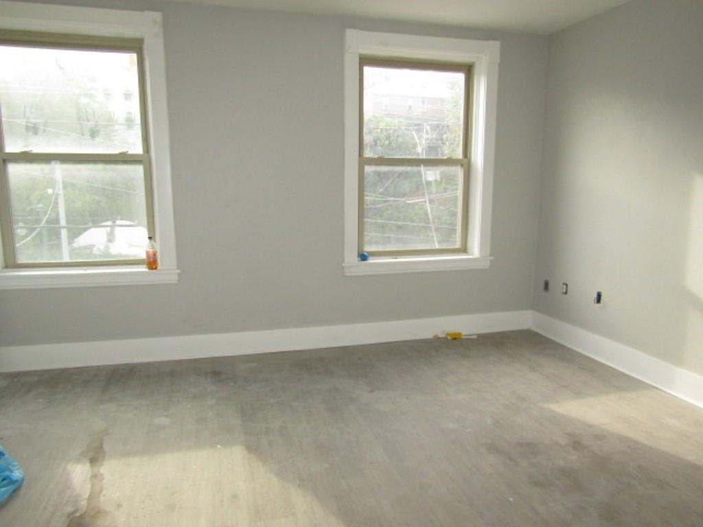 407-409 West 8th Avenue Homestead, PA 15120 - Photo 28 of 36 an empty room with a window