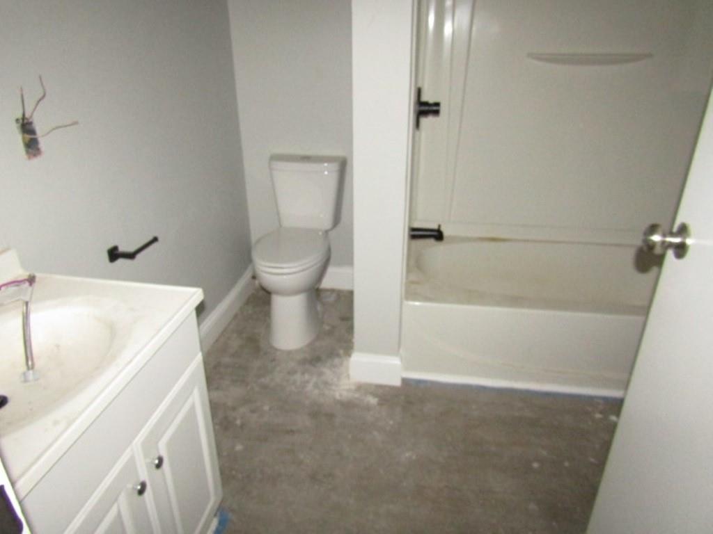 407-409 West 8th Avenue Homestead, PA 15120 - Photo 29 of 36 a bathroom with a sink a toilet and shower