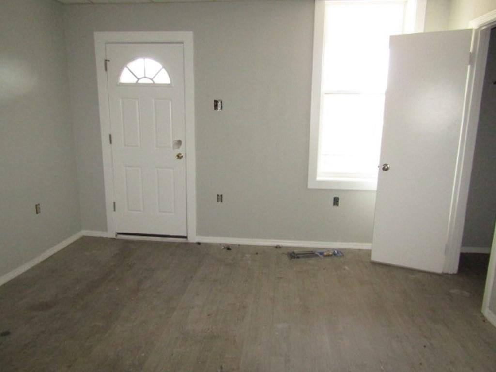 407-409 West 8th Avenue Homestead, PA 15120 - Photo 31 of 36 an empty room with windows