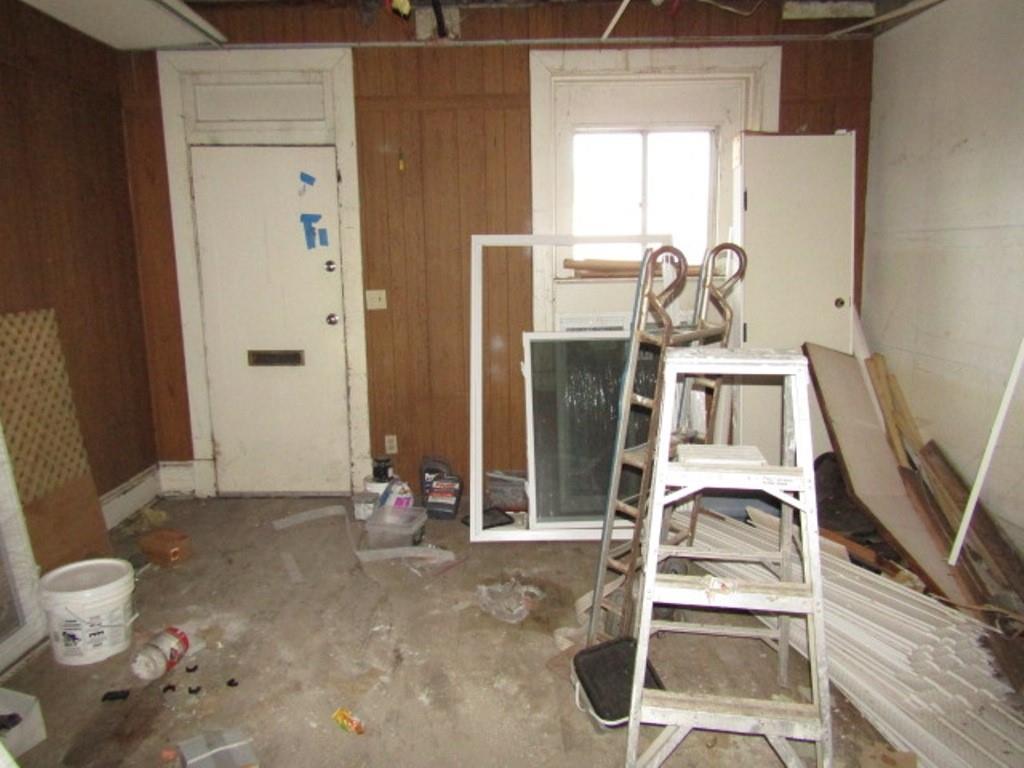 407-409 West 8th Avenue Homestead, PA 15120 - Photo 36 of 36 a view of a room with wooden floor and furniture