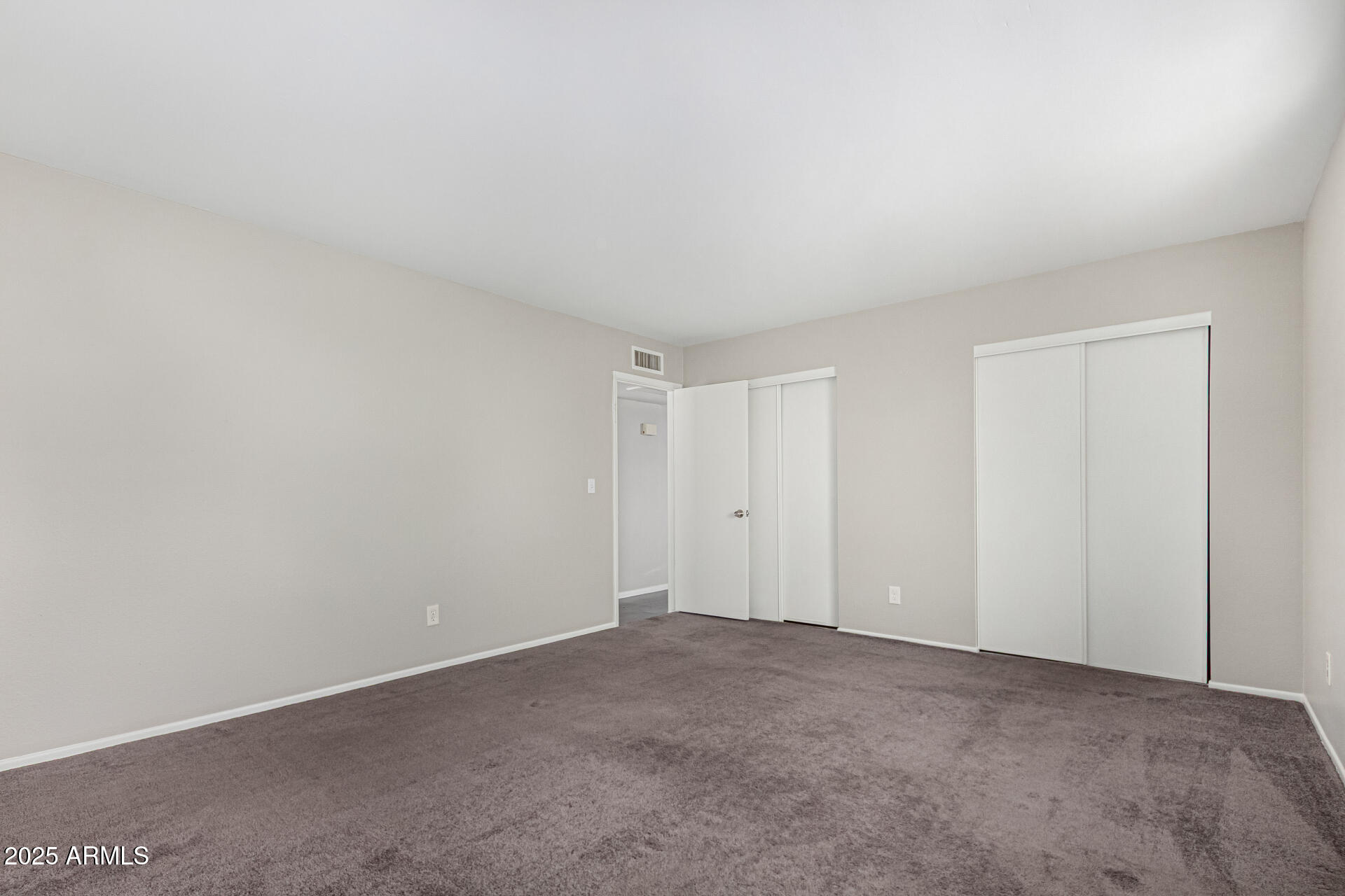 2133 West Turney Avenue, Unit D76 Phoenix, AZ 85015 - Photo 15 of 28 a view of an empty room