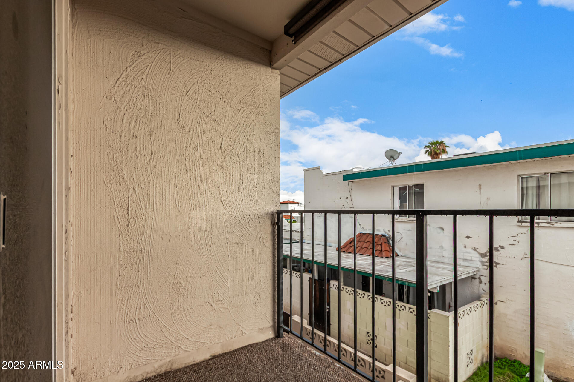 2133 West Turney Avenue, Unit D76 Phoenix, AZ 85015 - Photo 19 of 28 a view of a balcony