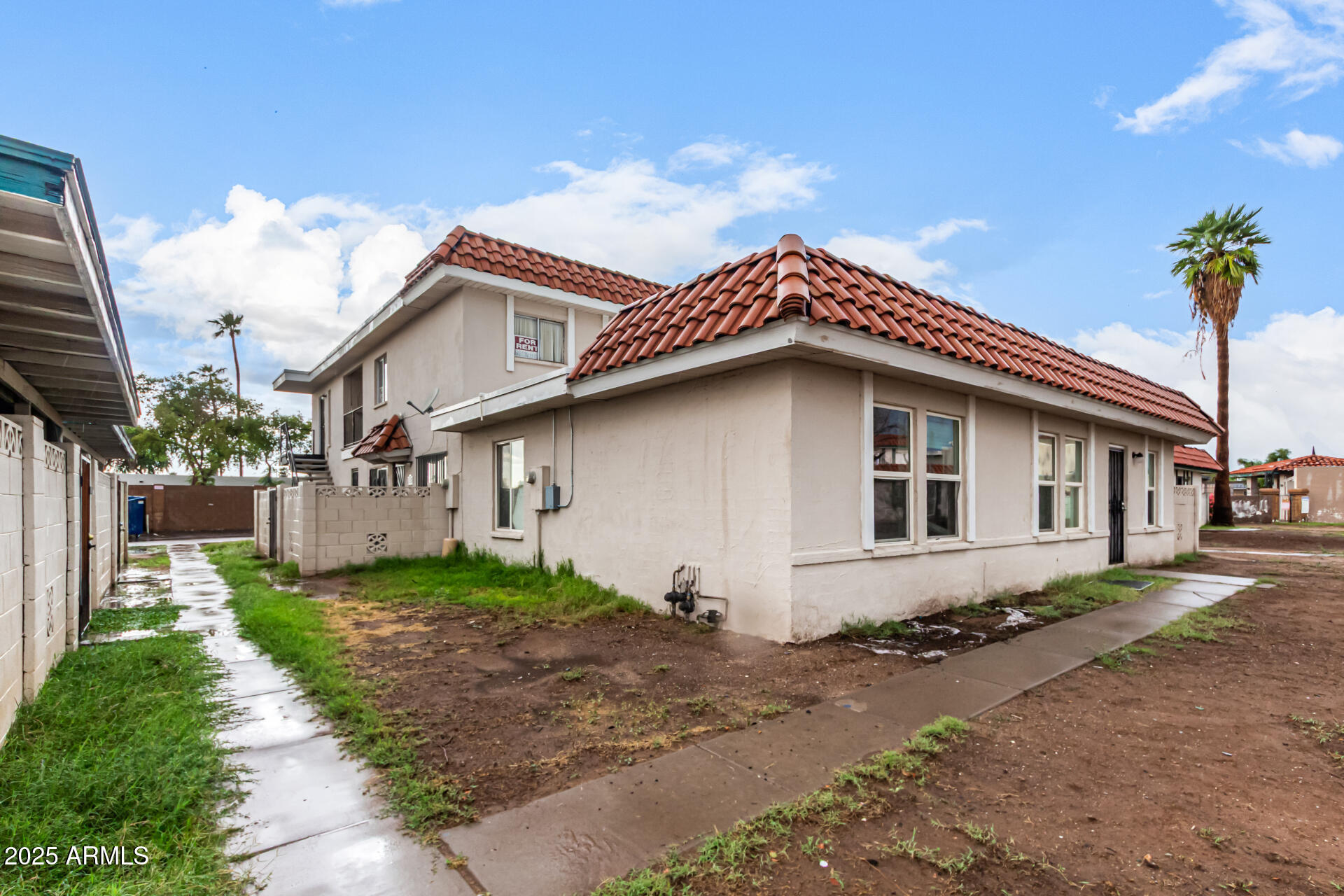 2133 West Turney Avenue, Unit D76 Phoenix, AZ 85015 - Photo 21 of 28 a house with a yard