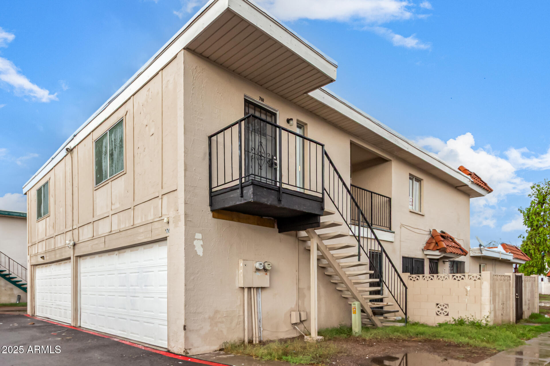 2133 West Turney Avenue, Unit D76 Phoenix, AZ 85015 - Photo 22 of 28 a view of a house with a street