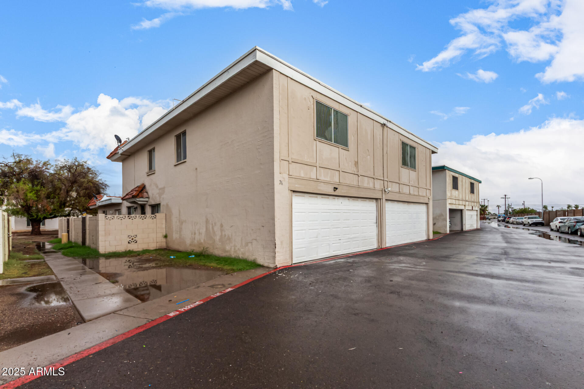 2133 West Turney Avenue, Unit D76 Phoenix, AZ 85015 - Photo 24 of 28 a view of a house with a street