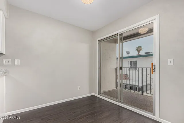 a view of entryway with wooden floor