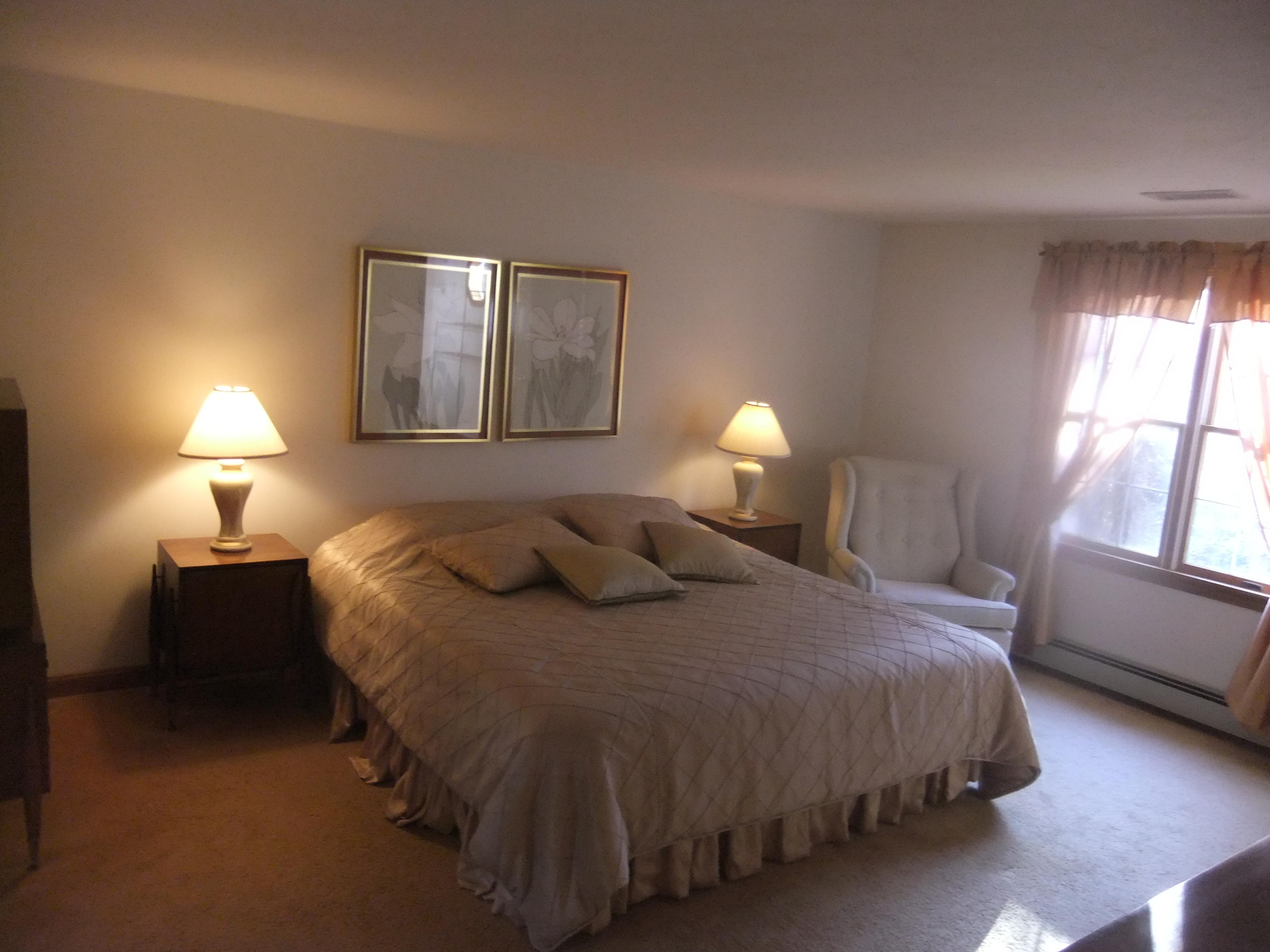 33 Ridgewood Road Orleans, MA 02653 - Photo 9 of 35 a bedroom with a bed and a window