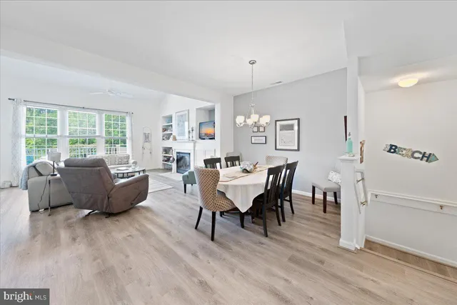 a view of a livingroom with furniture and wooden floor