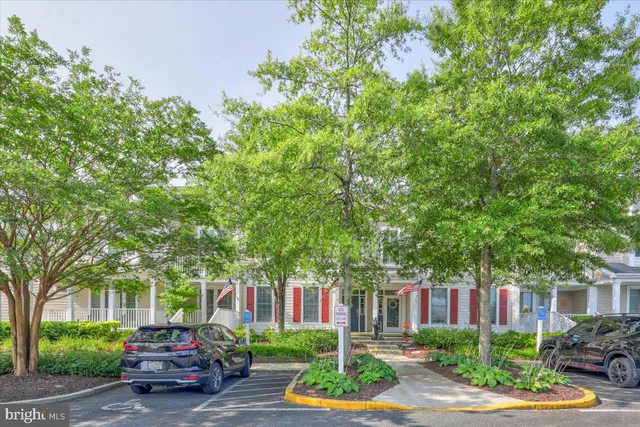 a bedroom with two beds and painted walls