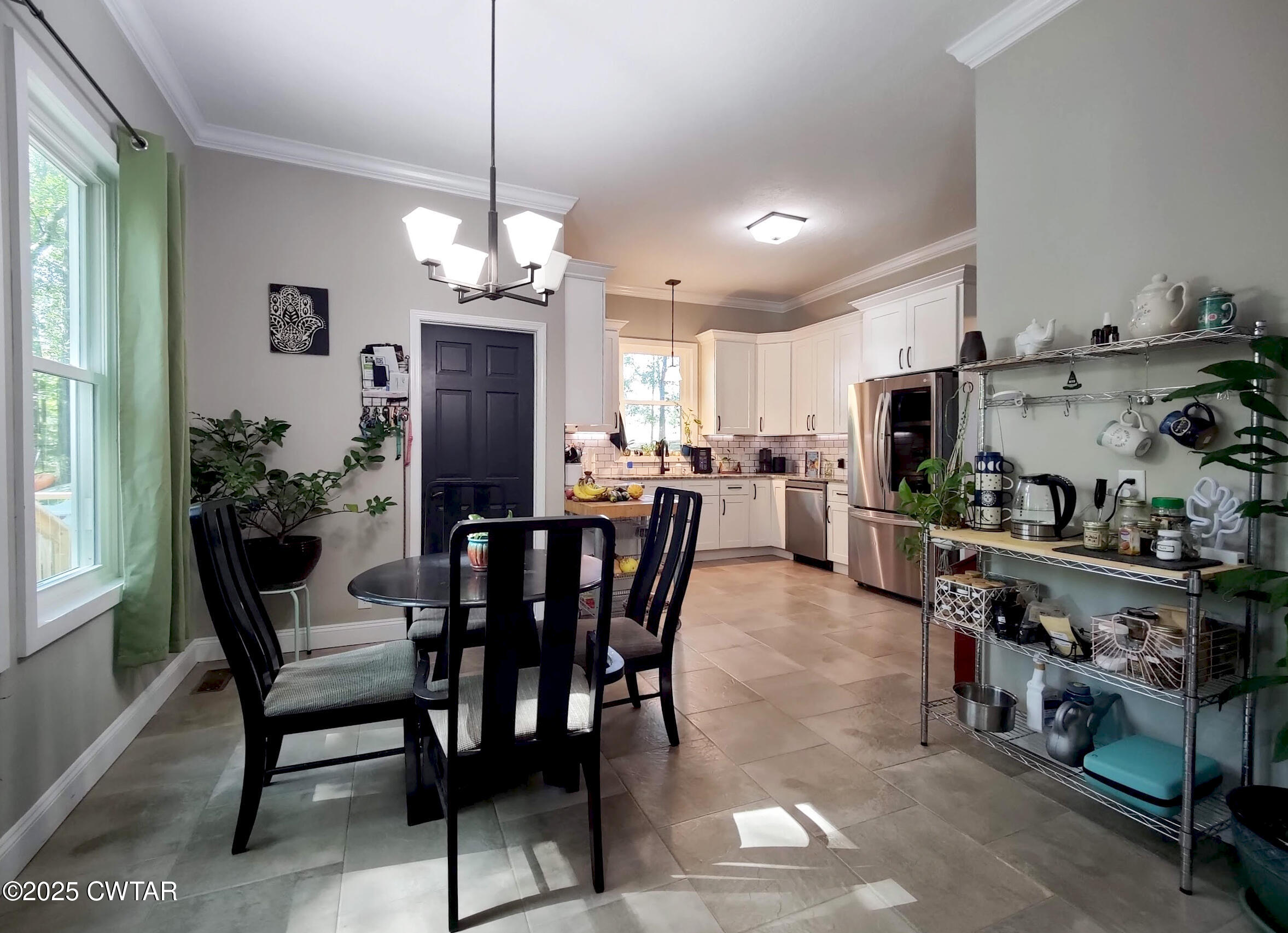 1620 Brooks Road Atwood, TN 38220 - Photo 12 of 34 a view of a dining room kitchen and a window