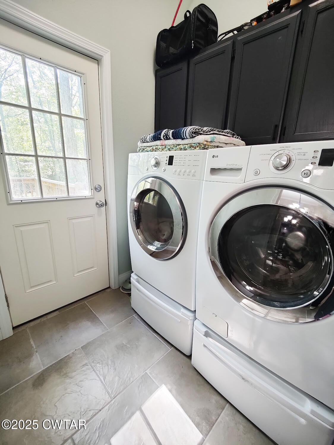 1620 Brooks Road Atwood, TN 38220 - Photo 14 of 34 a utility room with dryer and washer