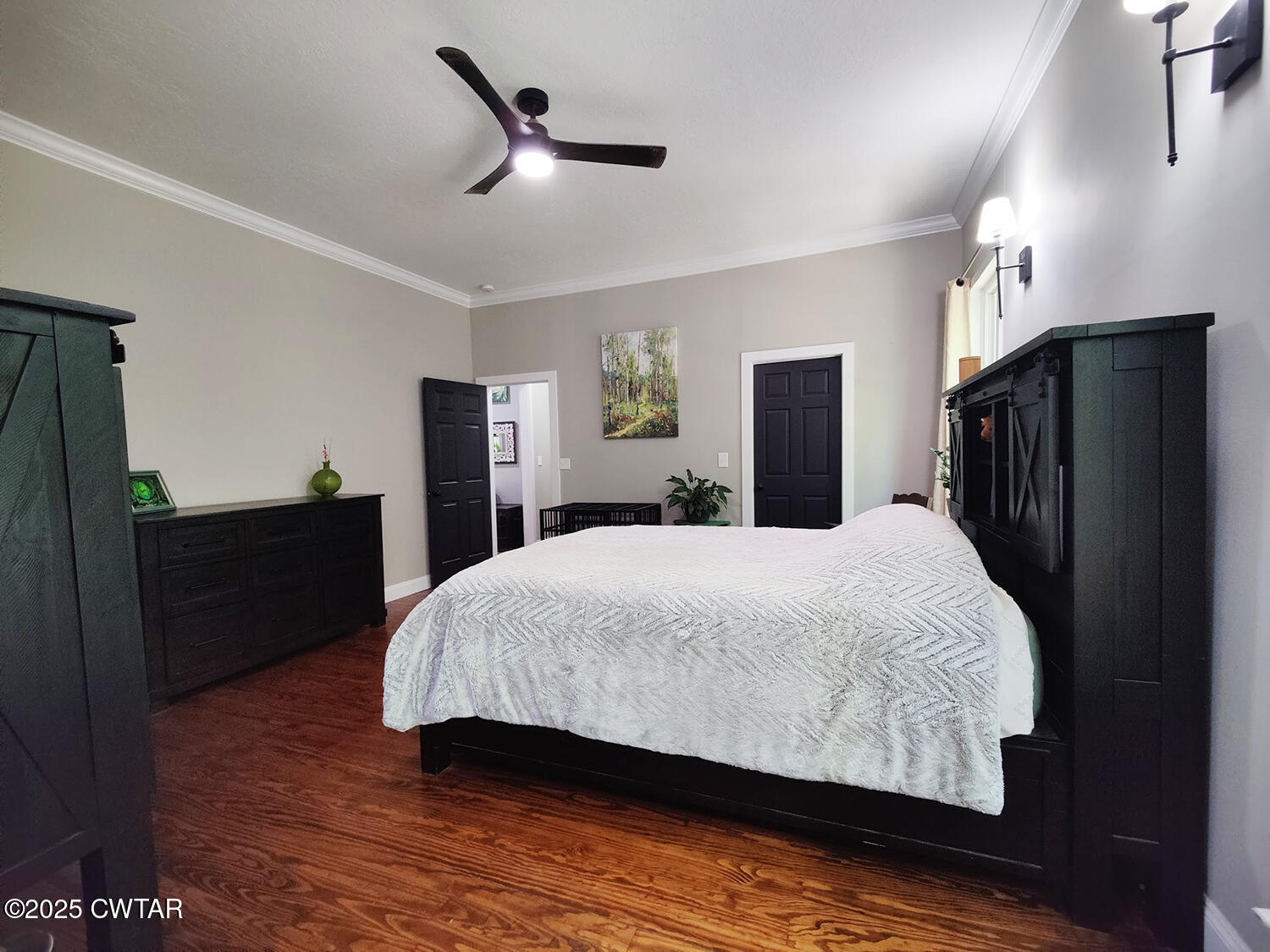 1620 Brooks Road Atwood, TN 38220 - Photo 17 of 34 a bedroom with a bed and a dresser