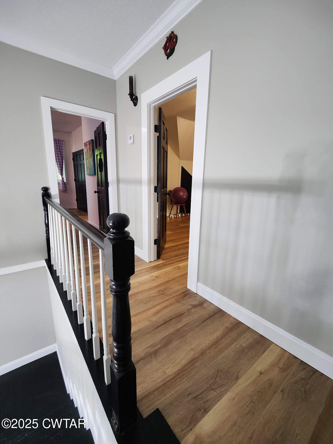 1620 Brooks Road Atwood, TN 38220 - Photo 25 of 34 a view of a hallway with wooden floor and stairs