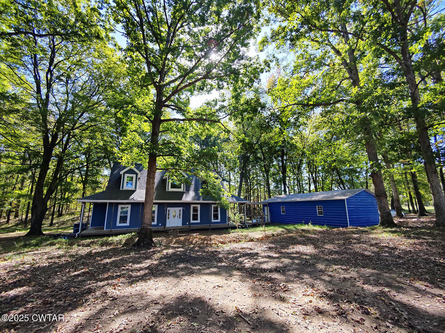 1620 Brooks Road Atwood, TN 38220 - Photo 34 of 34 a front view of a house with a yard