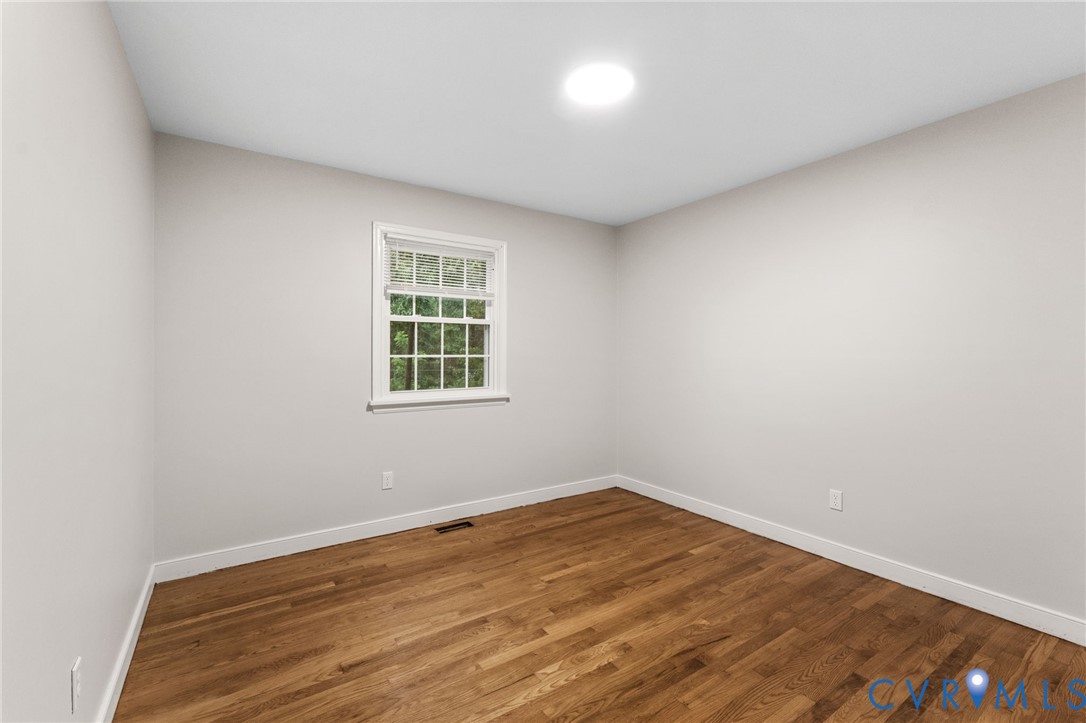 3151 Mountclair Road Chester, VA 23831 - Photo 25 of 36 Bright room featuring wood-finish flooring, white