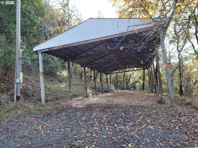 781 Plin Street Myrtle Creek, OR 97457 - Photo 6 of 10 a backyard of a house with lots of green space