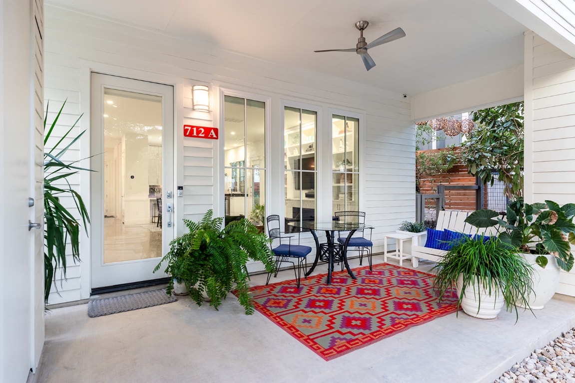 712 Cardinal Lane, Unit A Austin, TX 78704 - Photo 3 of 37 Welcoming front porch with ceiling fan overlooks fenced front yard