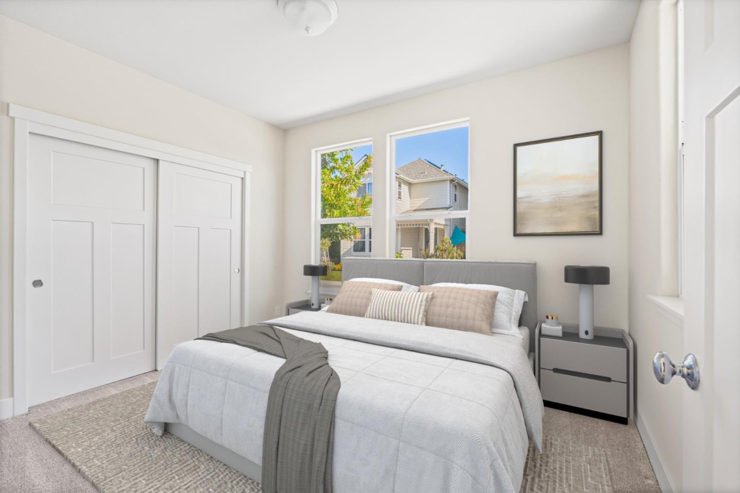 19134 Fallingwater Lane Marina, CA 93933 - Photo 12 of 32 a bedroom with a bed and a large window