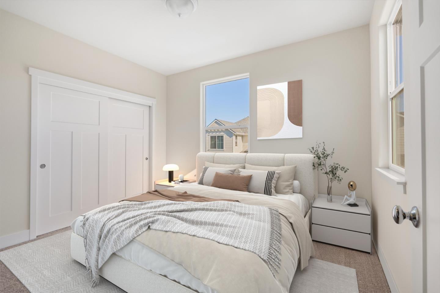 19134 Fallingwater Lane Marina, CA 93933 - Photo 18 of 32 a bedroom with a bed and a window