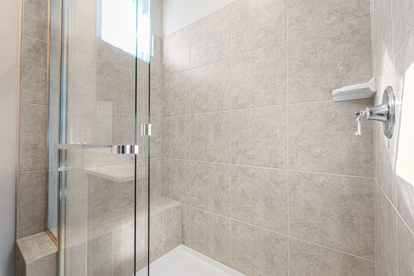 19134 Fallingwater Lane Marina, CA 93933 - Photo 21 of 32 a bathroom with a shower