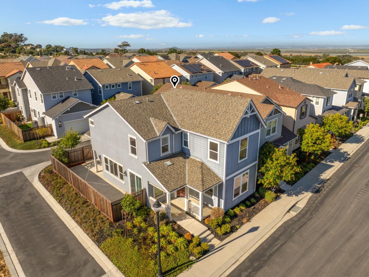 19134 Fallingwater Lane Marina, CA 93933 - Photo 28 of 32 an aerial view of multiple houses with a yard