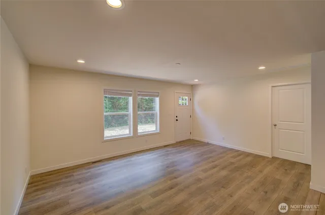 a view of kitchen with wooden floor