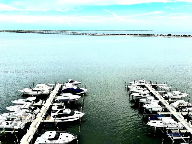 a picture of a lake with outdoor seating