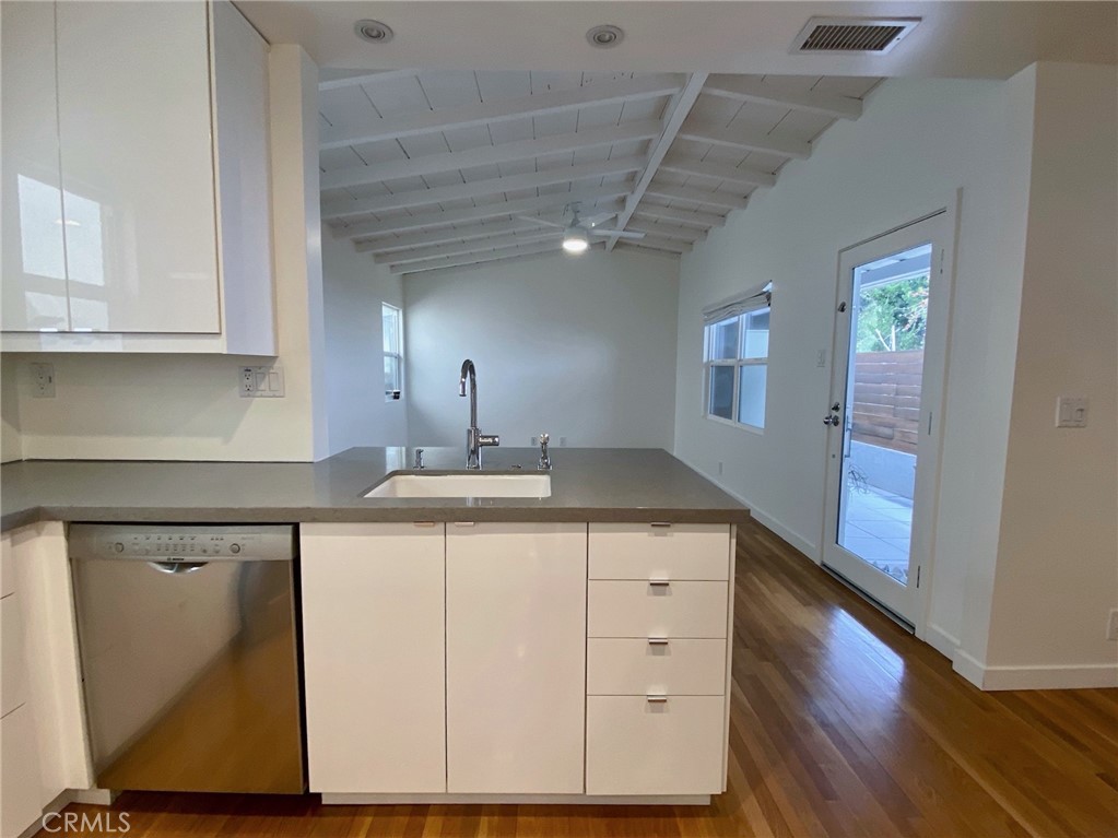 656 Rosecrans Avenue Manhattan Beach, CA 90266 - Photo 9 of 32 a kitchen with a sink a cabinets and window
