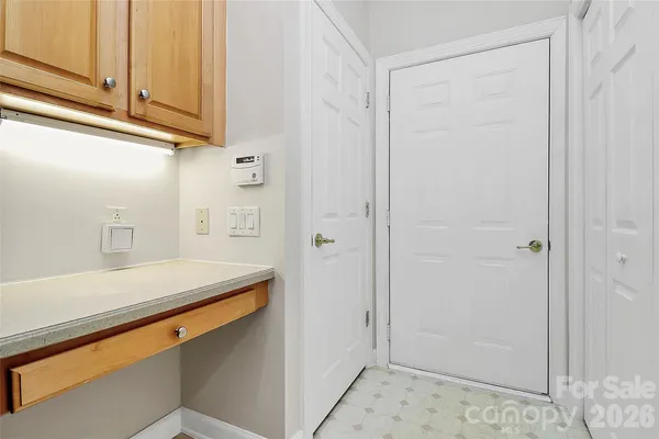 a bathroom with a sink and a shower