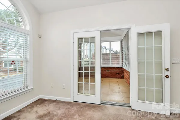 a view of a room with windows