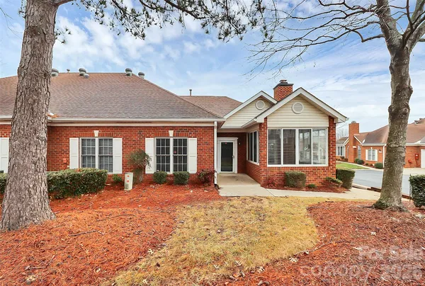 a sign board on the side of a road