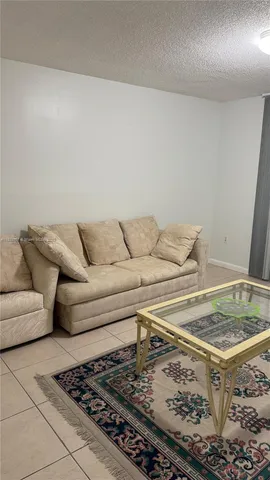 a living room with a couch