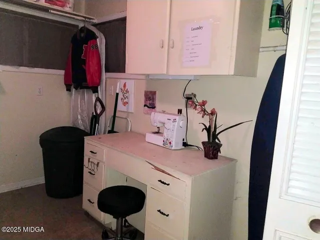 a view of electric appliances and cabinets