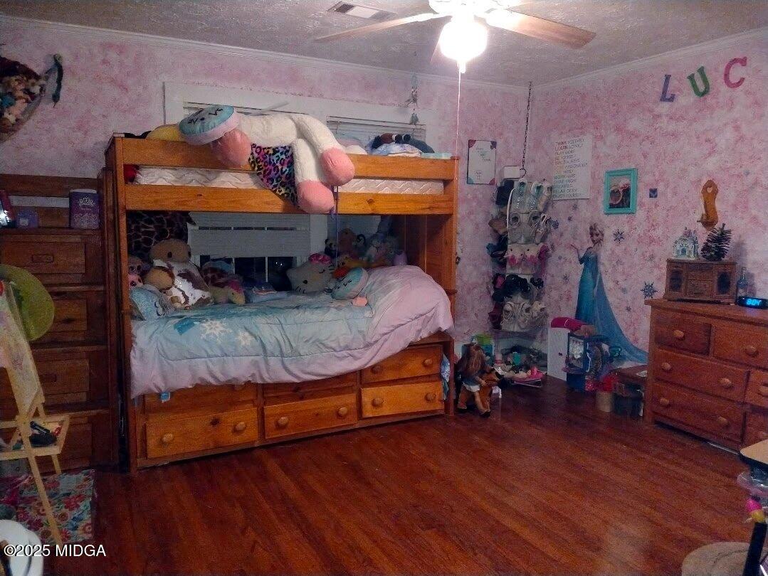 152 North Main Street Gordon, GA 31031 - Photo 32 of 37 a room with wooden floors and furniture