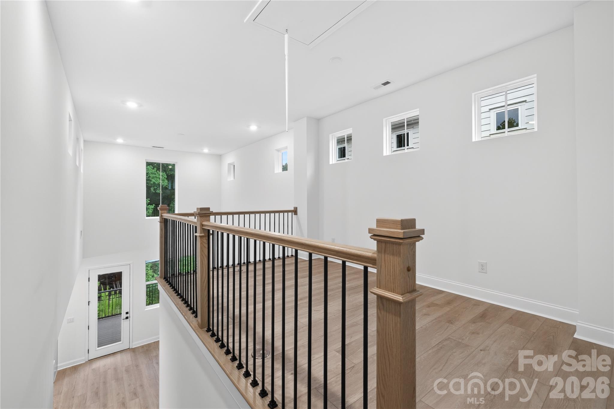 416 Celestial Drive Tega Cay, SC 29708 - Photo 11 of 21 a view of hallway with stairs