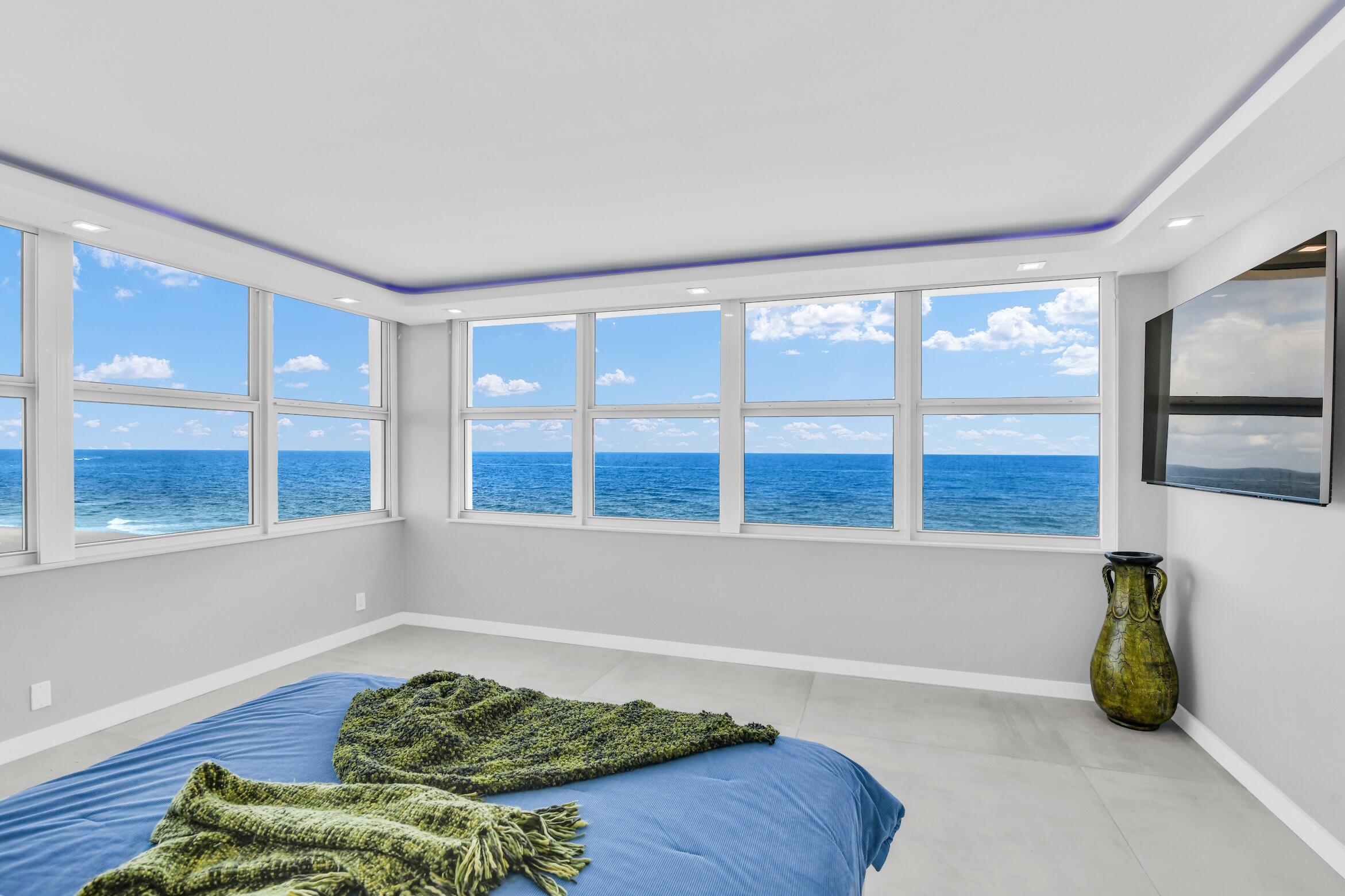 2000 South Ocean Boulevard, Unit 6K Boca Raton, FL 33432 - Photo 22 of 93 a bedroom with furniture and a large window